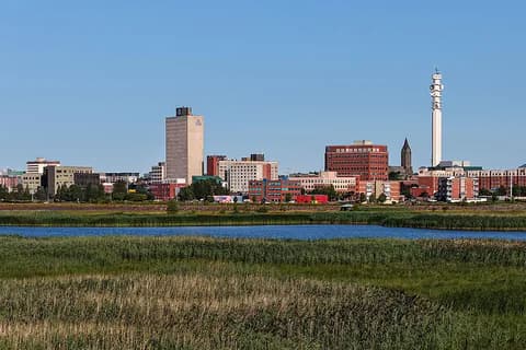 Downtown Moncton skyline seen across the Petitcodiac River marshland, New Brunswick